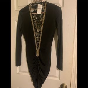 See thru black dress.